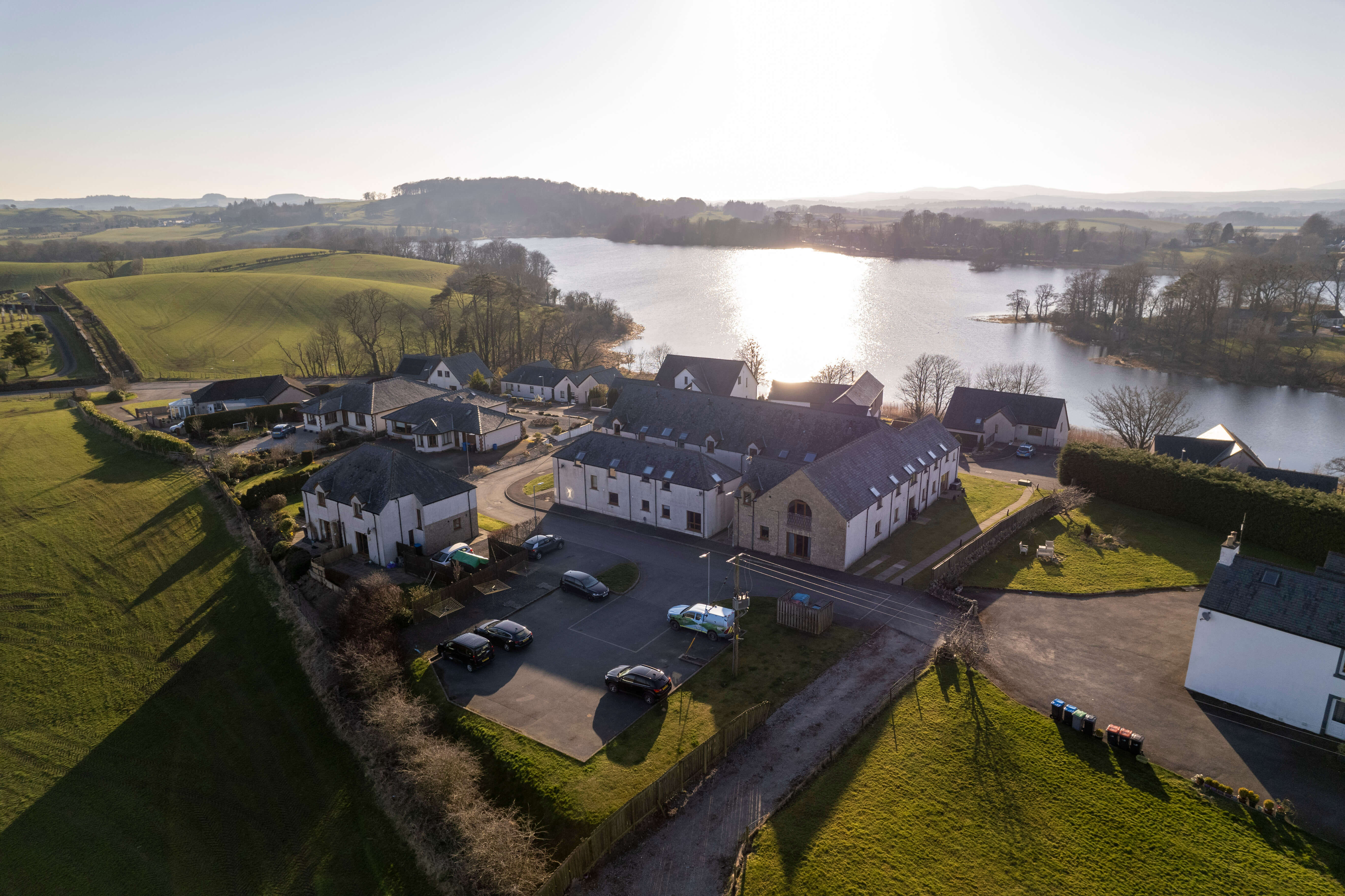 Drone aerial photograph of a property beside a loch in Dumfries and Galloway